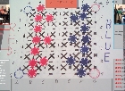a board game with red and blue pieces